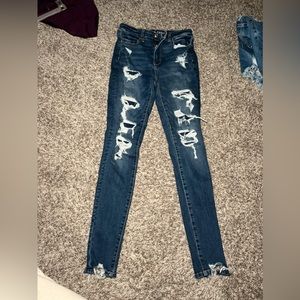 Medium/dark wash American eagle skinny Jean distressed size 8,long